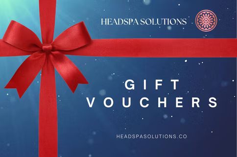 Gift vouchers with a red ribbon and 'HEADSPA SOLUTIONS' branding on a blue background.