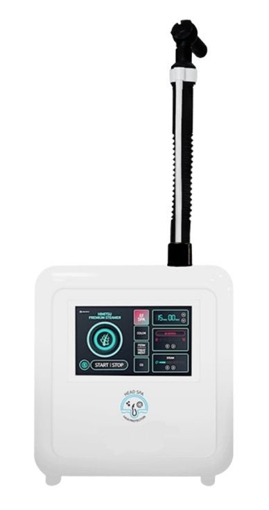 White electronic device with digital display and black hose on a white background